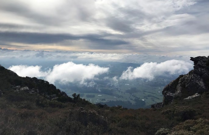 A group of clouds in the sky Description automatically generated